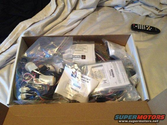 Box of American Autowire harnesses with part numbers visible