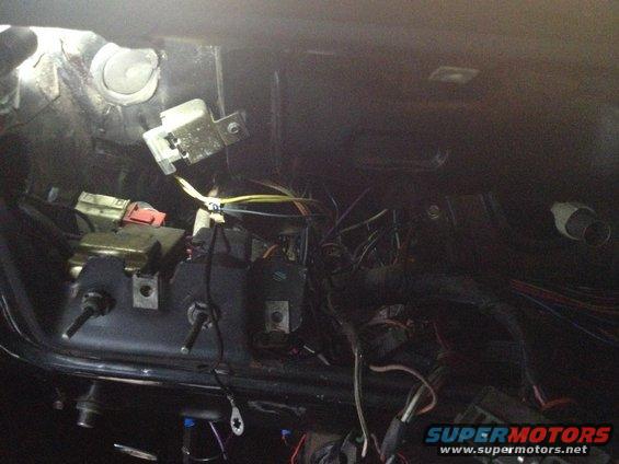 Vehicle interior wiring harness with exposed wires and electrical components