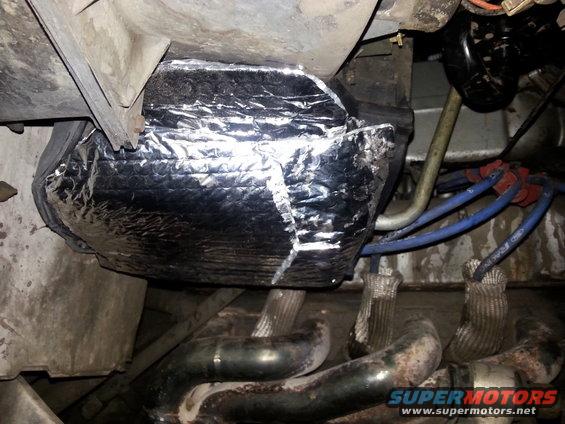 20140624_210255.jpg bottom view. doubled up on the insulation here. I think that should work pretty well...I may still go back and add a couple of staples to help hold everything in place. I think a combination of the engine heat and the condensation will make the adhesive come off.

next step will be to see if it helps cool any better.