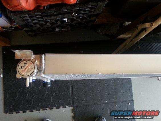 20140625_143858.jpg view from the top. considering the difference in thickness from the old unit, I hoping there won't be any clearance issues with the fan shroud..will have to see once I get the old one removed.