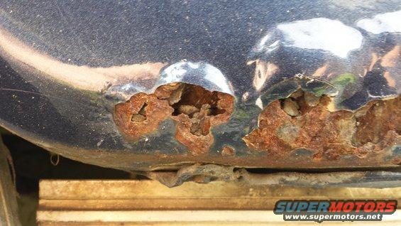 Driver's side front fender, aft of wheel well. 