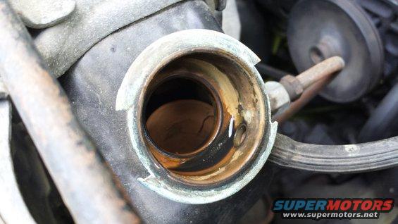 Radiator cap opening with rust and liquid inside