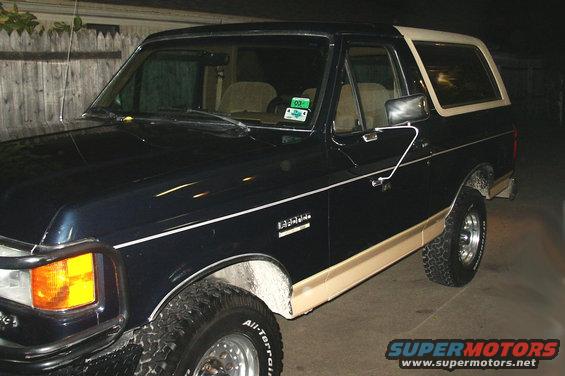 1991 Ford Bronco 3q-front view, dark blue with tan trim