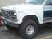 1986 Ford Bronco - This Ford Bronco, likely from the early 1980s, is shown from the front quarter with modifications.