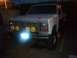 1986 Ford Bronco - This 1986 Ford Bronco features a unique set of four yellow smiley face lights mounted on its grille.