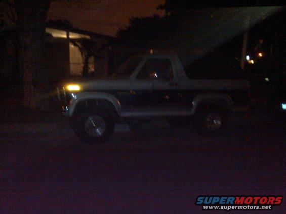 1986 Ford Bronco, two-tone side profile at night