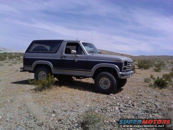 Ford Bronco parked on a rocky, desert landscape