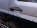 1986 Ford Bronco - The side door handle and two-tone trim are visible on this 1986 Ford Bronco.