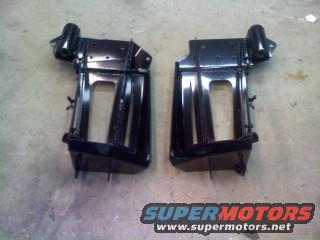Two black metal brackets with mounting points, likely for a vehicle