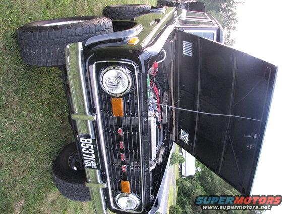 1979 Ford Bronco front view, hood open, showing engine bay. License plate B5371VA
