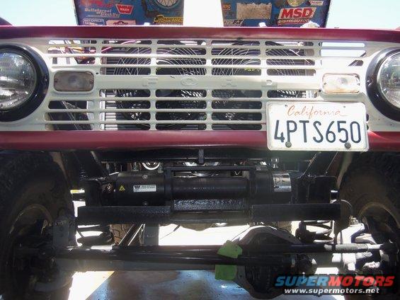 Ford Bronco grille, headlights, and winch. California license plate reads 4PTS650