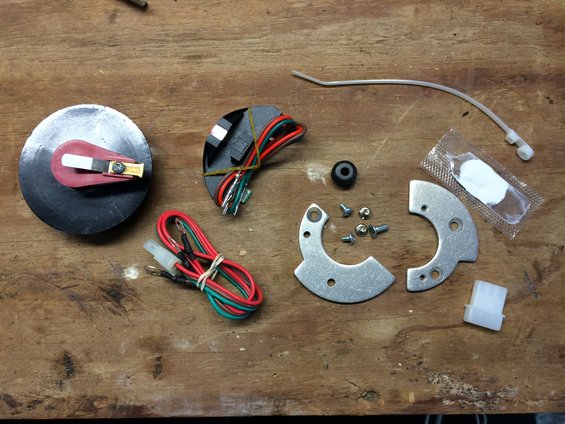 Mallory Electronic Ignition parts including a distributor cap, rotor, and wiring