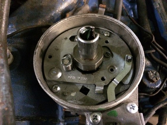 Close-up of distributor cap interior with 'MADE IN USA' visible