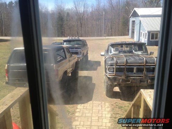 Black Ford F-250 with a large front brush guard, seen from the front