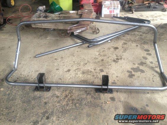 Custom roll bar frame on concrete floor