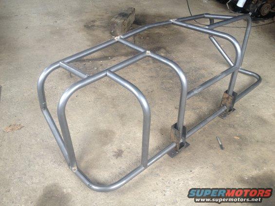 custom metal roll cage frame on concrete floor