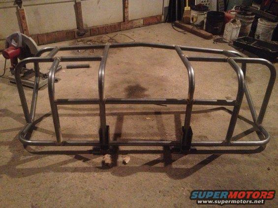 Custom roll cage fabricated from metal tubing