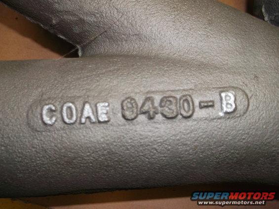 Cast iron engine part with casting numbers COAE 9430-B