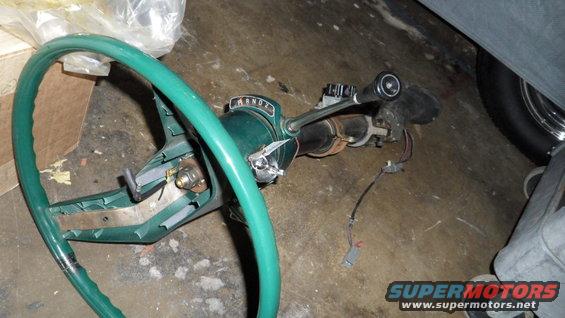 Green steering wheel and column with PRNDL indicator, wires disconnected