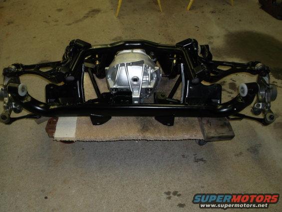 Rear axle assembly with differential and suspension components