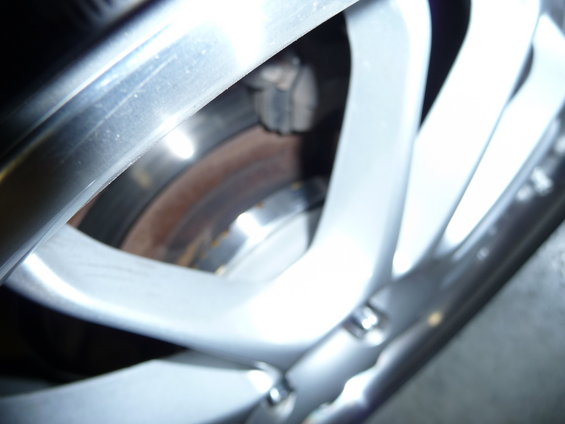 Close-up of a car's wheel and brake rotor