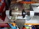 1993 Mazda MX-3 - Close-up of a suspension component, identified by text as 'SuperPro SPK 1742', being worked on in a vise.