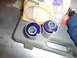 1993 Mazda MX-3 - Suspension bushings, likely for a vehicle's LCA, are shown with part numbers visible on one of them.