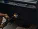 1997 Dodge 3500 - Welding repair on a heavy-duty black metal bumper.