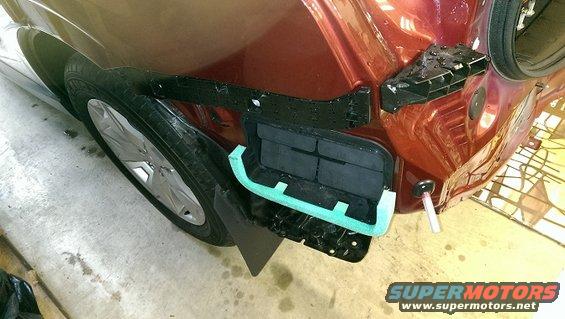 2015 Subaru Forester rear bumper removed, showing internal mounting points and foam padding