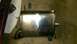 2015 Subaru Forester - This is an exhaust muffler with a bent pipe and a mounting bracket. The registry claims it is from a 2015 Subaru Forester, but this cannot…