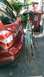 2015 Subaru Forester - A teal bicycle is attached to the hitch of a dark red Subaru Forester.