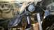 1988 Ford Bronco - Underside view of vehicle steering and suspension components, including a shock absorber.