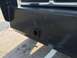 1997 Dodge 3500 - Close-up of a heavy-duty truck's front bumper, showing a hitch receiver and part of the grille.