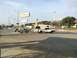1997 Dodge 3500 - A 1997 Dodge 3500 pickup truck with a camper shell is seen towing a boat trailer.