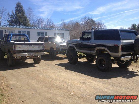 Rear view of a lifted 1979 Ford Bronco with a spare tire mount