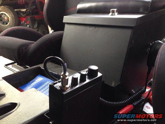 Tuffy center console, the CB hooks onto the side. 