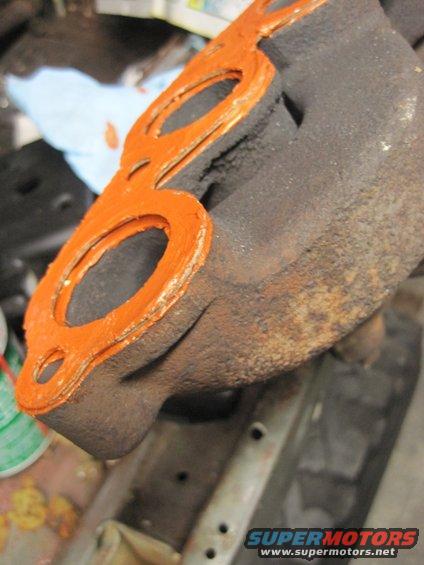 Exhaust manifold gasket with orange sealant