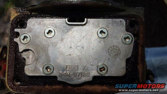 Metal plate with part number 34R-9716B and UDC 7