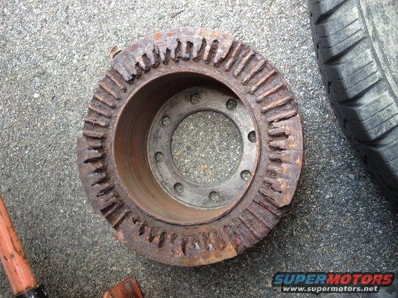 Rusted brake rotor with damaged teeth