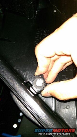 Driver's side rear door.  Close-up of the anchor that cracks easily.