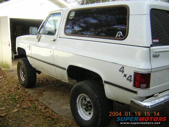 White 1984 Chevrolet Blazer 4x4 parked outside a garage