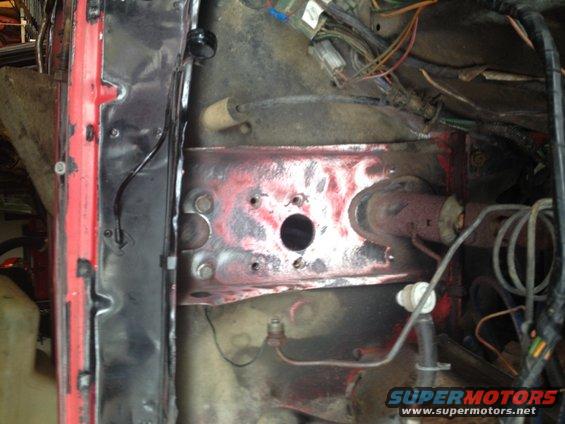Engine bay wiring and brake components with red paint markings