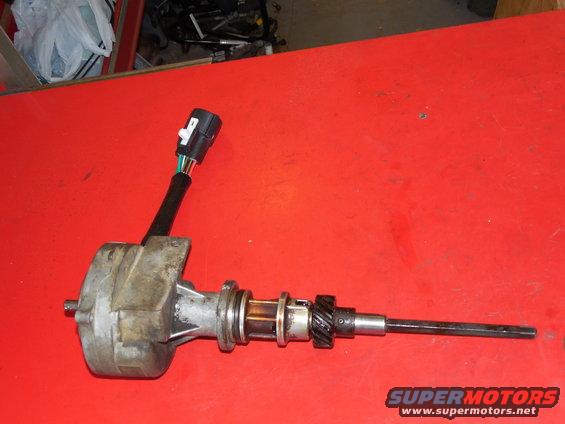 50pip5.jpg The PIP itself is simple to install - only getting to it is hard.  Being careful of alignment, I hammered the gear back on, and drove the pin back in.  It spins smoothly with no wobble.  I primed it with oil before installation.

[url=http://www.supermotors.net/registry/media/833750][img]http://www.supermotors.net/getfile/833750/thumbnail/distributor9296.jpg[/img][/url]

GO TO THE NEXT PIC...