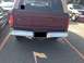 1996 Ford Bronco - This Ford Bronco, likely from the early to mid-1990s, is parked in a lot with other vehicles visible.