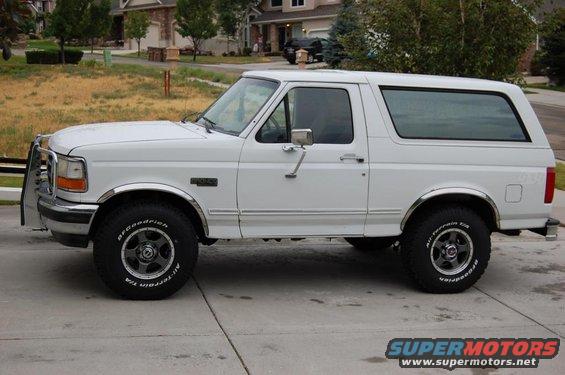 White 1995 Ford Bronco side view