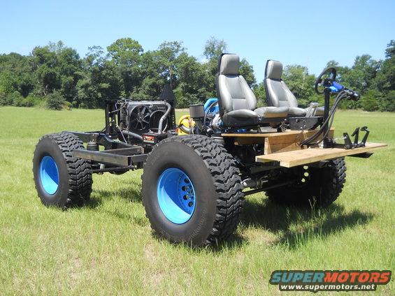 Custom off-road vehicle chassis with two seats and large tires