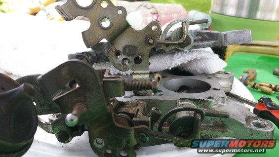 Carburetor assembly with linkages and bolts