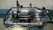 1996 Ford F-150 - Internal view of transmission shift forks and shafts within the casing.