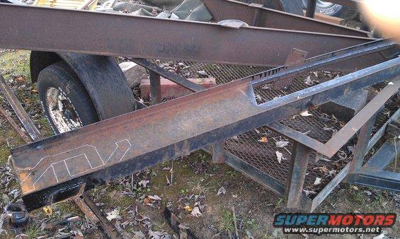 Trailer frame with cutouts and chalk markings