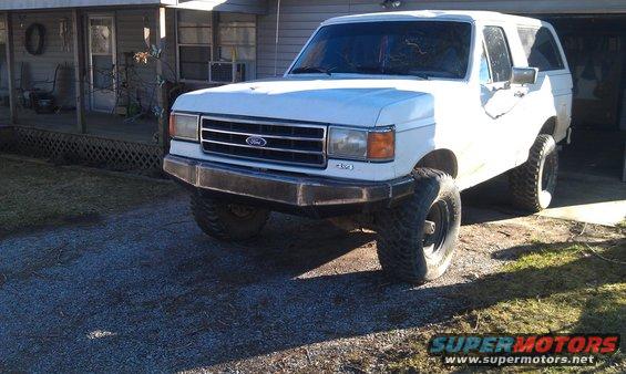 White 1990 Ford Bronco 3q-front view with aftermarket bumper